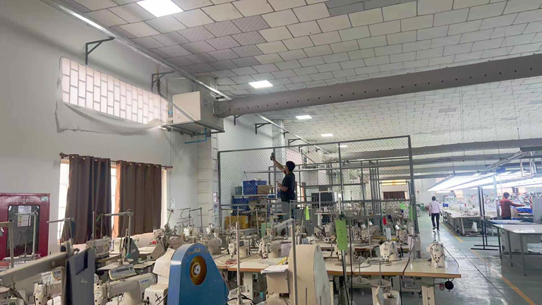 大型制衣廠區(qū)域降溫，應(yīng)用蒸發(fā)冷省電空調(diào)-臥式管道空調(diào)機(jī)組